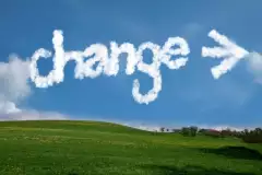 Wolke in Form von dem Wort "change" und einem Pfeil